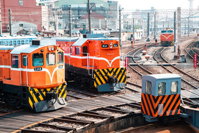 Train on railroad track in city