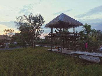 Built structure on landscape against sky
