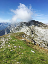 Scenic view of snowcapped mountains against sky