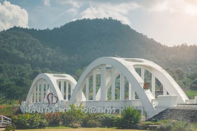 Arch bridge against sky
