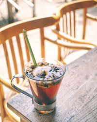 High angle view of wedang uwuh in glass on table