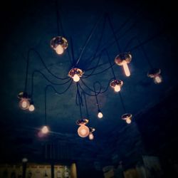 Low angle view of illuminated street light