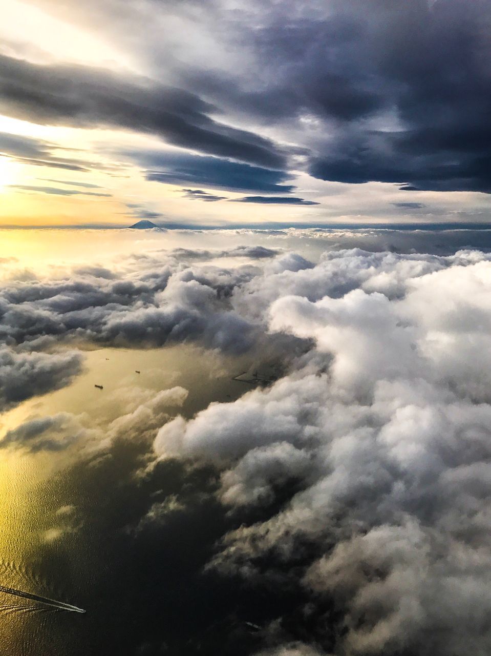 cloud - sky, cloudscape, sky, nature, beauty in nature, weather, dramatic sky, scenics, aerial view, atmospheric mood, tranquility, no people, outdoors, heaven, storm cloud, day