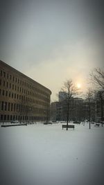 Buildings in city against sky