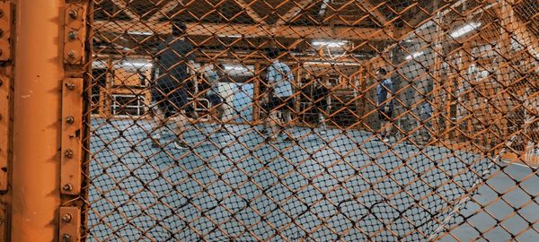 Full frame shot of chainlink fence in cage