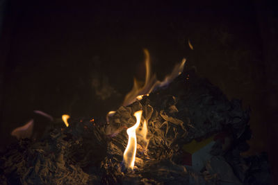 Close-up of fire in the dark