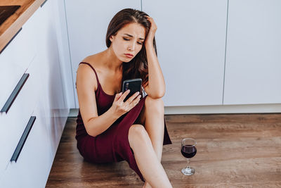 Young woman using mobile phone