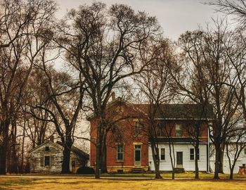 Built structure with trees in foreground