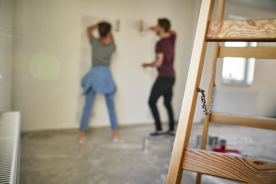 Low angle view of woman walking on floor