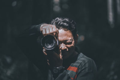 Portrait of man photographing