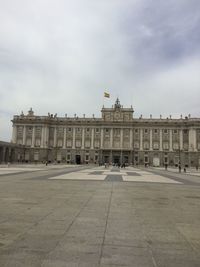 View of building against cloudy sky