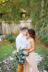 Young couple standing outdoors