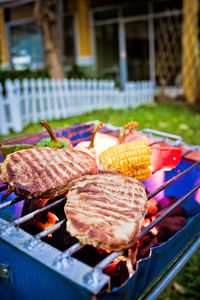 Close-up of meat on barbecue grill