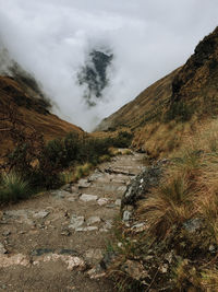 Scenic view of mountains against sky while hiking the ancient inka trail to machu picchu