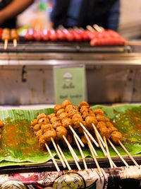 Close-up of meat on barbecue grill