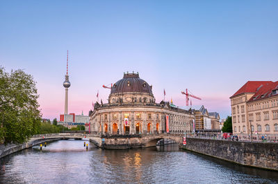 View of river with buildings in background