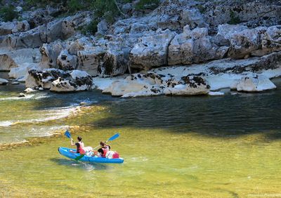Two people canoeing in the ardeche river