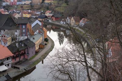 High angle view of river amidst buildings in town