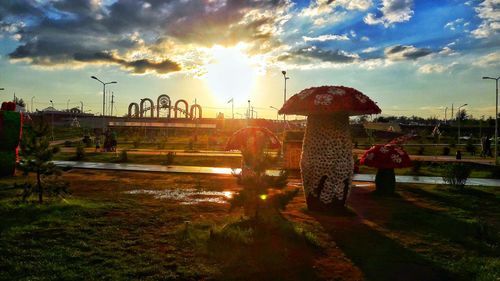 People at park against sky during sunset