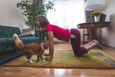 Woman with dog at home