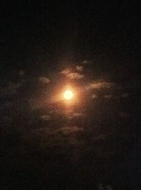 Low angle view of moon against sky at night