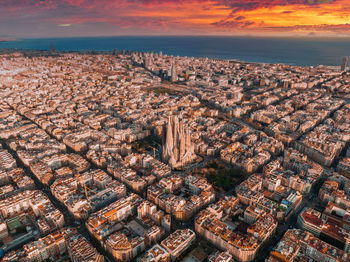 High angle view of city at sunset