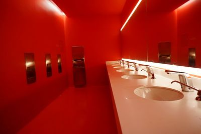 Interior of red public restroom