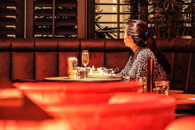 Woman sitting in restaurant