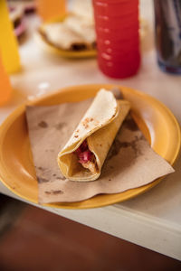 High angle view of taco served in plate on table