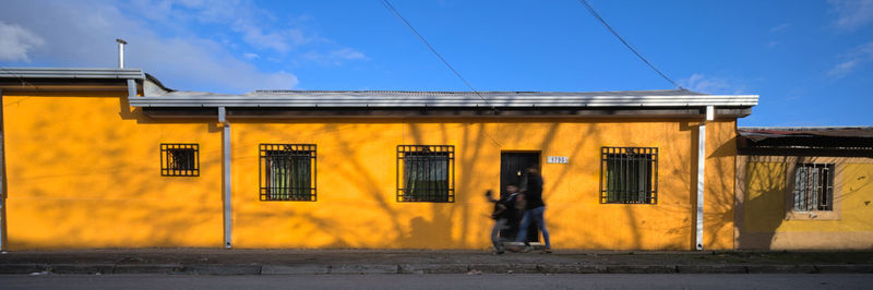 Low angle view of building against sky, adobe traditional village house, talca, chile 
