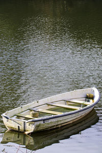 High angle view of boat moored in lake