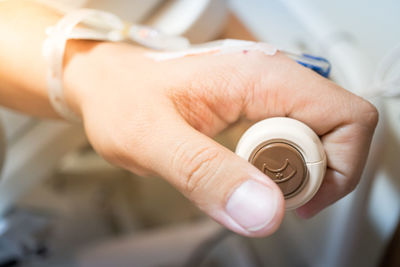 Close-up of woman holding hands