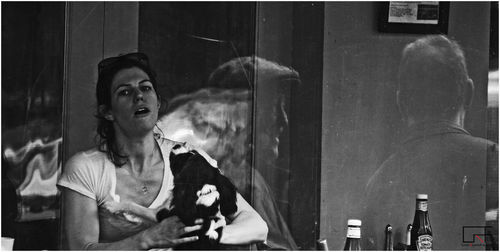 Portrait of young woman looking at camera