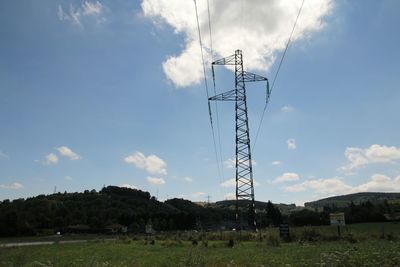 Electricity pylon on field