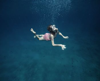 Girl swimming in sea