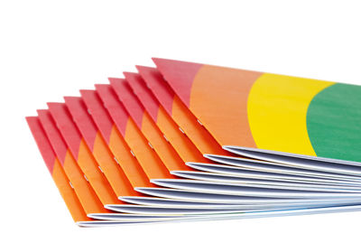Stack of paper against white background