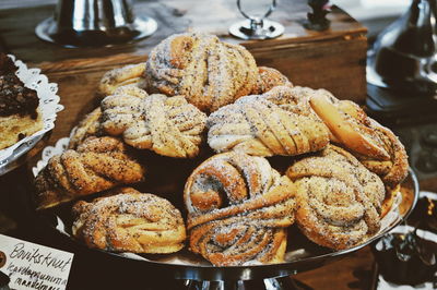 High angle view of buns in plate on table