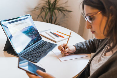 White woman working from home