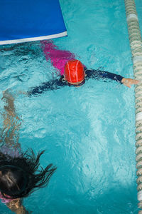 High angle view of person swimming in pool