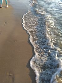 High angle view of surf on beach