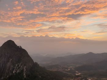 Scenic view of mountains against sky during sunrise