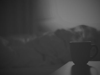 Close-up of coffee cup at home