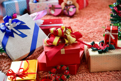 High angle view of christmas decorations on rug