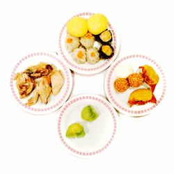 High angle view of food served on white background