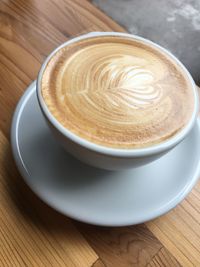 Close-up of cappuccino on table