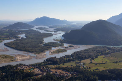 High angle view of landscape and mountains against sky