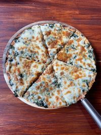 High angle view of pizza on table