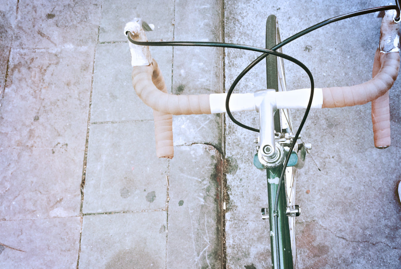 metal, wall - building feature, safety, protection, security, high angle view, metallic, close-up, outdoors, day, chain, no people, part of, fence, wall, bicycle, sidewalk, rusty, old, handle