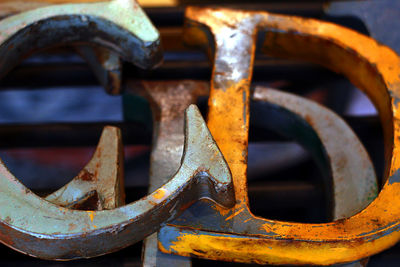 High angle view of metal alphabets