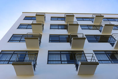 Low angle view of the bauhaus school building in dessau, against a blue sky